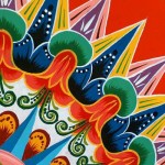 Oxcart wheel, painted in spectacular designs.