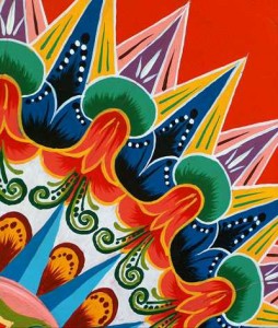 Oxcart wheel, painted in spectacular designs.